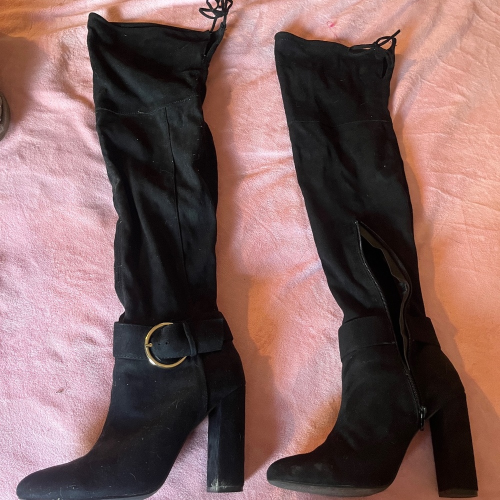 Thigh high heeled boots
